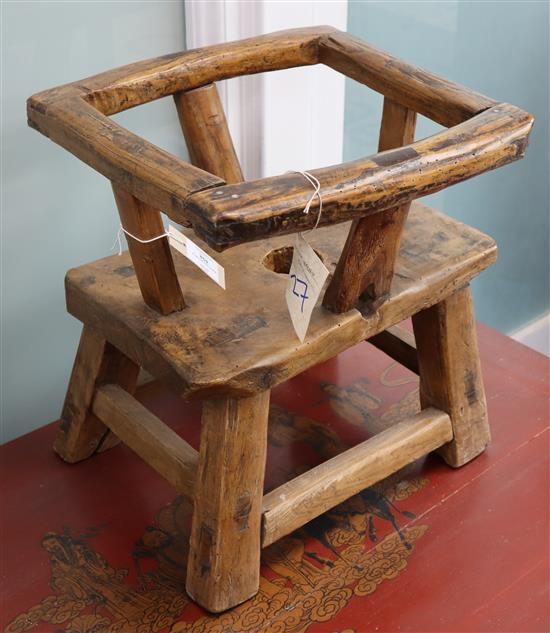 A Chinese elm childs chair, Shangdong origin W.40cm